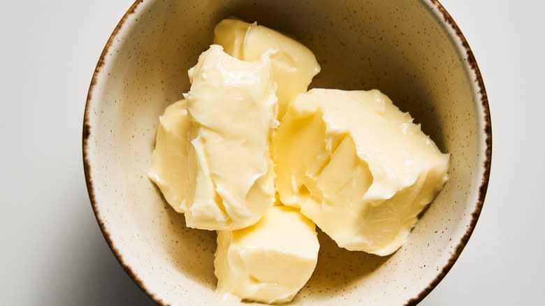 Bowl of butter on white