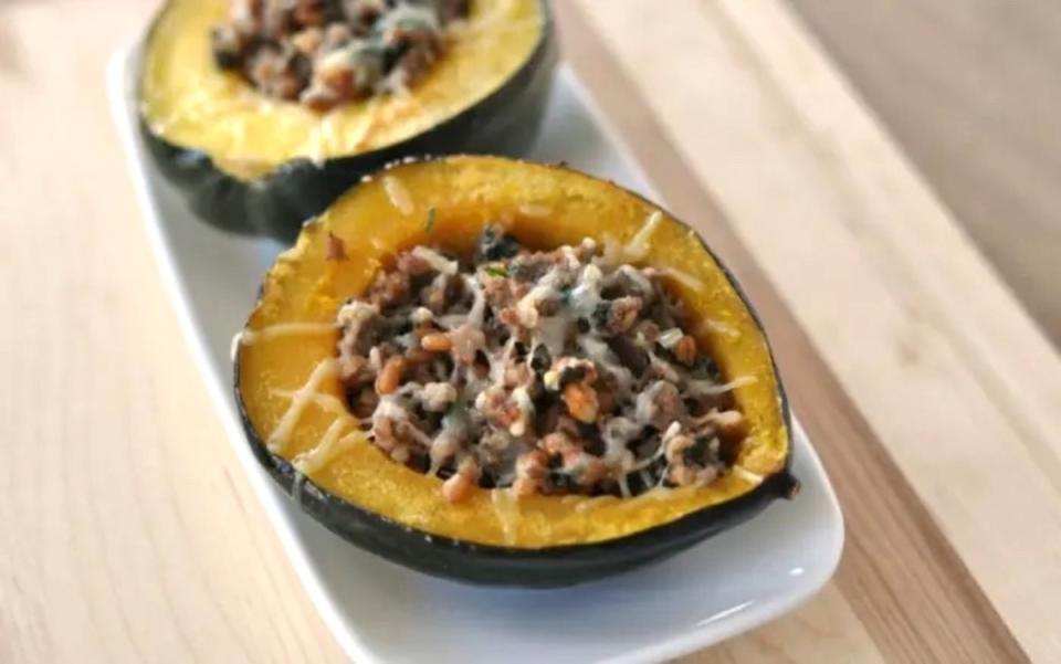 <p>Shannah Coe</p><p>Spelt, an ancient grain, adds a slight nutty flavor to these stuffed acorn squash. If you don't have the ingredient, you can easily substitute a wild rice or another grain for the spelt if you choose.</p><p><strong>Get the recipe: <a href="https://parade.com/841566/shannahcoe/stuffed-acorn-squash/" rel="nofollow noopener" target="_blank" data-ylk="slk:Stuffed Acorn Squash;elm:context_link;itc:0;sec:content-canvas" class="link ">Stuffed Acorn Squash</a></strong></p>