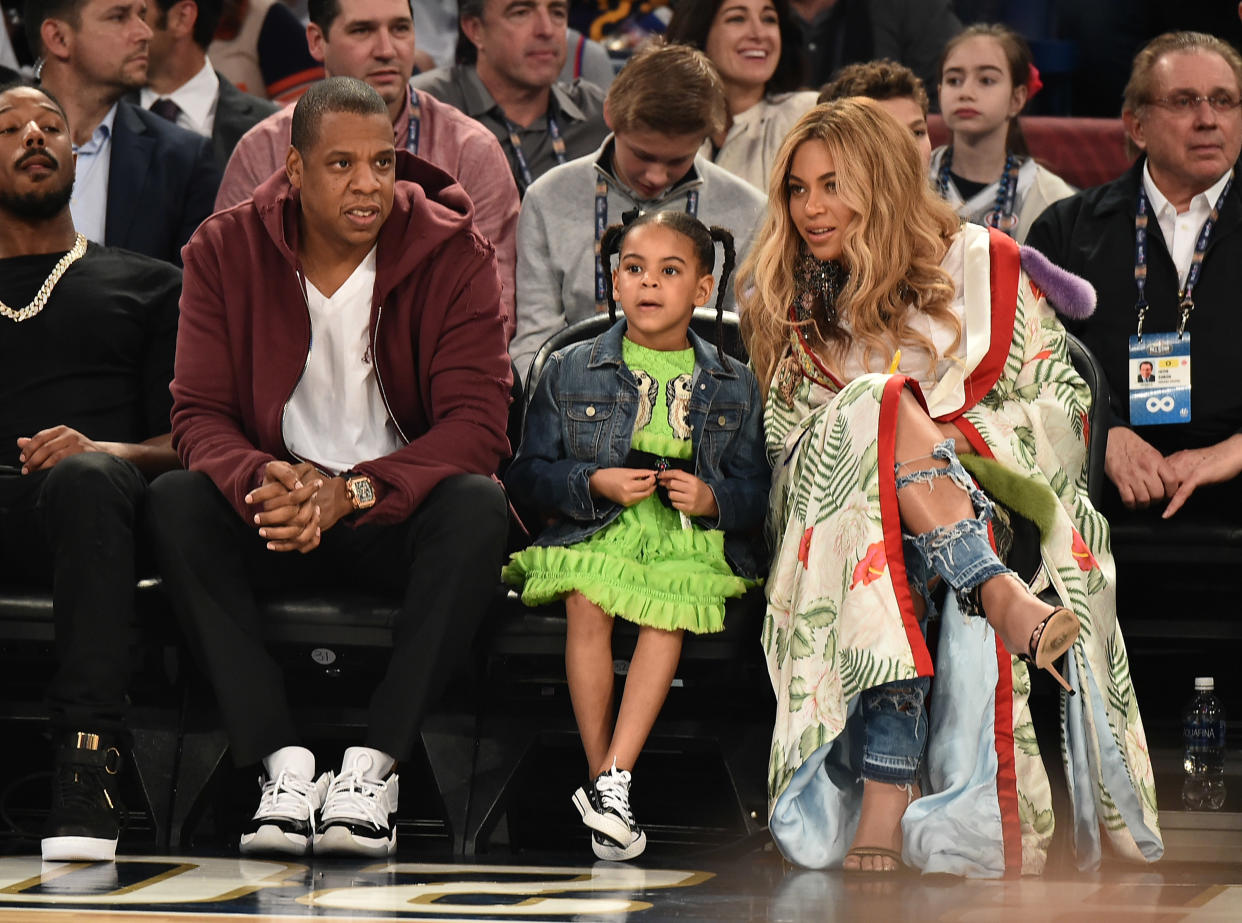 NEW ORLEANS, LA - FEBRUARY 19:  (L-R) Jay Z, Blue Ivy Carter and Beyoncé Knowles attend the 66th NBA All-Star Game at Smoothie King Center on February 19, 2017 in New Orleans, Louisiana.  (Photo by Theo Wargo/Getty Images)