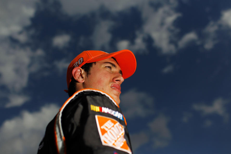 DAYTONA BEACH, FL - FEBRUARY 19: Joey Logano, driver of the #20 The Home Depot Toyota, looks on after qualifying for the NASCAR Sprint Cup Series Daytona 500 at Daytona International Speedway on February 19, 2012 in Daytona Beach, Florida. (Photo by Tom Pennington/Getty Images for NASCAR)