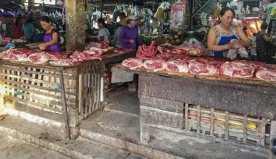 Piles of butchered pork at the market