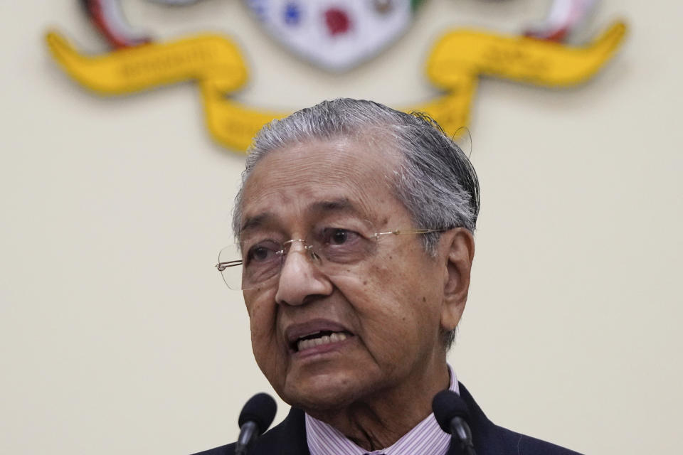 Malaysian interim leader Mahathir Mohamad speaks during a press conference at his office in Putrajaya, Malaysia, Thursday, Feb. 27, 2020. Mahathir says Parliament will pick a new prime minister after the king failed to establish who has majority support following the collapse of the ruling coalition. (AP Photo/Vincent Thian)