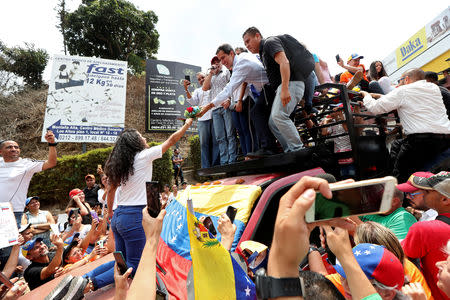 Venezuelan opposition leader Juan Guaido, who many nations have recognised as the country's rightful interim ruler, attends a rally in Carrizal, Venezuela, March 30, 2019. REUTERS/Ivan Alvarado