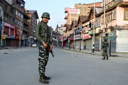 Tens of thousands of Indian troops have enforced a lockdown in Kashmir