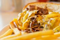 <p><strong>Philly Cheesesteak</strong></p><p>This one is a no-brainer. A visit to Philly isn’t a proper one without trying a proper Philly Cheesesteak. We know, we know, <a href="https://www.genosteaks.com/" rel="nofollow noopener" target="_blank" data-ylk="slk:Geno's;elm:context_link;itc:0;sec:content-canvas" class="link ">Geno's</a> or <a href="https://www.patskingofsteaks.com/" rel="nofollow noopener" target="_blank" data-ylk="slk:Pat’s;elm:context_link;itc:0;sec:content-canvas" class="link ">Pat’s</a>? Here’s a secret -- both iconic restaurants are amazing, but this friendly camaraderie probably boosts sales for both. </p>