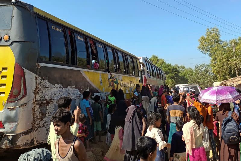 Buses wait to carry Rohingyas from a refugee camp of Cox's Bazar to Chattogram, from where they will eventually be shifted to Bhasan Char island in Cox's Bazar