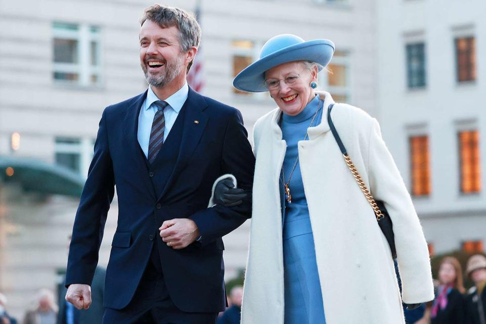 <p>Maja Hitij/Getty Images</p> Then-Crown Prince Frederik of Denmark and his mother Queen Margrethe visit the Brandenburg Gate on November 10, 2021 in Berlin, Germany