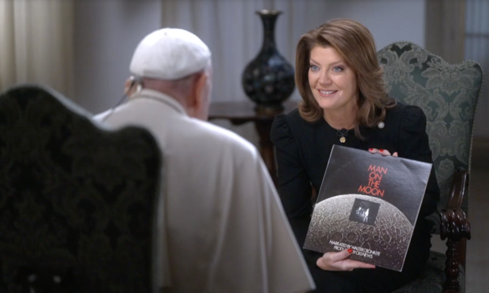 Norah O'Donnell gives Francis a gift from CBS News during a one-on-one interview in Vatican City. / Credit: CBS News