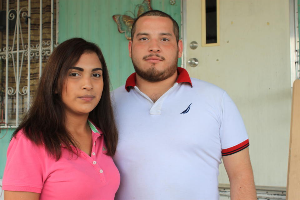 Gracie Perez, right, and husband Cesar Ramirez pose for a portrait Tuesday, Sept. 18, 2018, in Rio Bravo, Texas. Ramirez's sister, Melissa, was among the four victims authorities say were killed by a Border Patrol supervisor. (AP Photo/Susan Montoya Bryan)