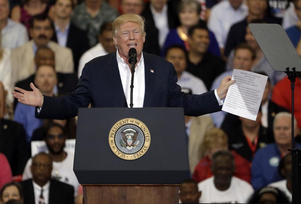 President Donald Trump gestures during his campaign rally in Florida: AP