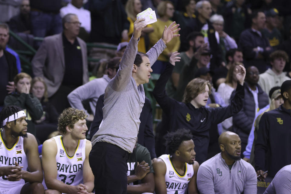 Baylor coach Scott Drew questions a call during the second half of the team's NCAA college basketball game against Oklahoma, Wednesday, Feb. 8, 2023, in Waco, Texas. (AP Photo/Rod Aydelotte)