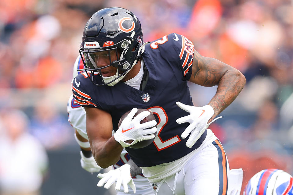 CHICAGO, ILLINOIS – AUGUST 26: DJ Moore #2 of the Chicago Bears runs with the ball after a reception against the Buffalo Bills during the first half of a preseason game at Soldier Field on August 26, 2023 in Chicago, Illinois. (Photo by Michael Reaves/Getty Images)