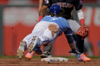 Kansas City Royals' Bobby Witt Jr. steals second during the third inning of a baseball game against the Cleveland Guardians Monday, Sept. 18, 2023, in Kansas City, Mo. (AP Photo/Charlie Riedel)