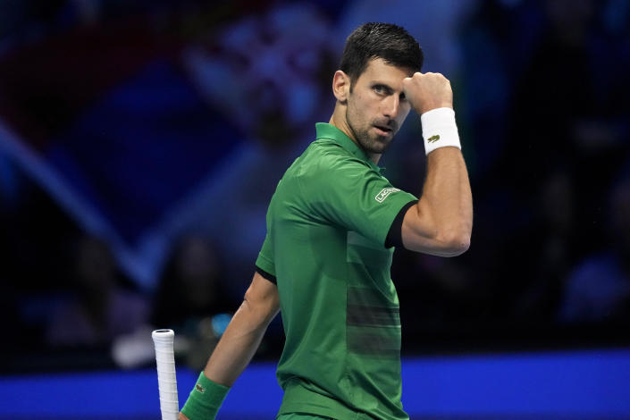 Serbia's Novak Djokovic celebrates after winning the first set against Norway's Casper Ruud during their singles final tennis match of the ATP World Tour Finals at the Pala Alpitour, in Turin, Italy, Sunday, Nov. 20, 2022. (AP Photo/Antonio Calanni)