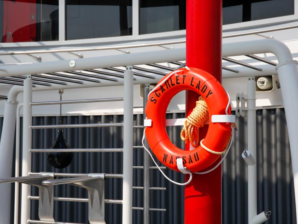 life preserver ring that says Scarlet Lady