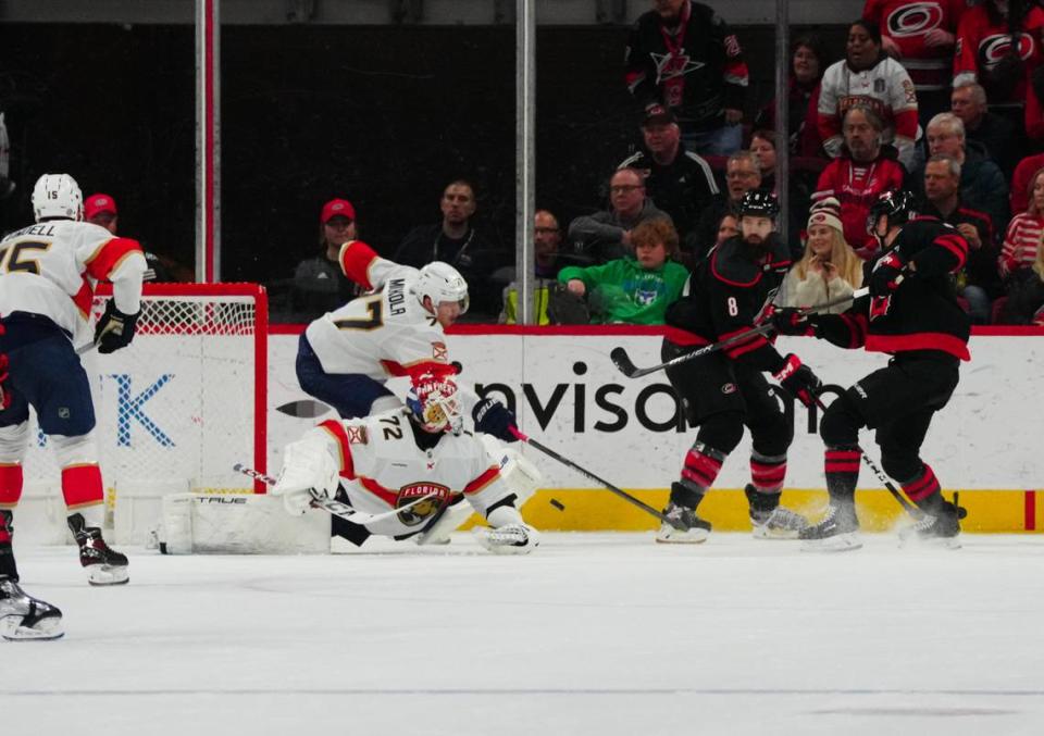 Feb 22, 2024; Raleigh, North Carolina, USA; Florida Panthers goaltender Sergei Bobrovsky (72) stops the scoring attempt by Carolina Hurricanes center Martin Necas (88) during the second period at PNC Arena. Mandatory Credit: James Guillory-USA TODAY Sports