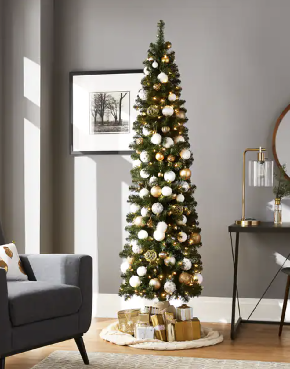 Noma Pre-Lit Boulevard Pencil Christmas Tree with Tree Stand, 7-ft (Photo via Canadian Tire)