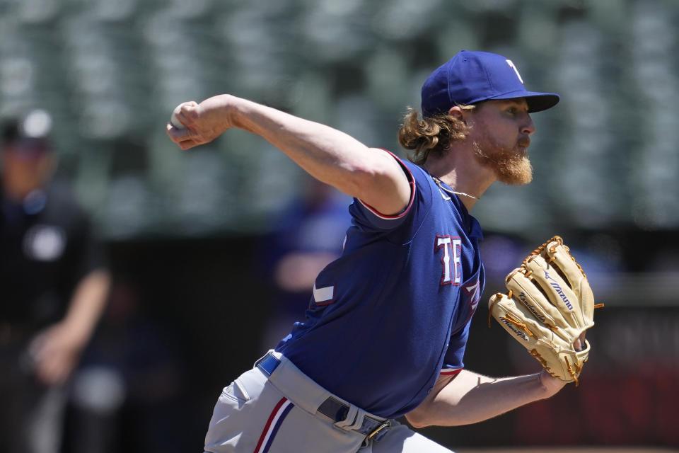 Texas Rangers pitcher Jon Gray works against the Oakland Athletics during the sixth inning of a baseball game in Oakland, Calif., Saturday, May 13, 2023. (AP Photo/Jeff Chiu)