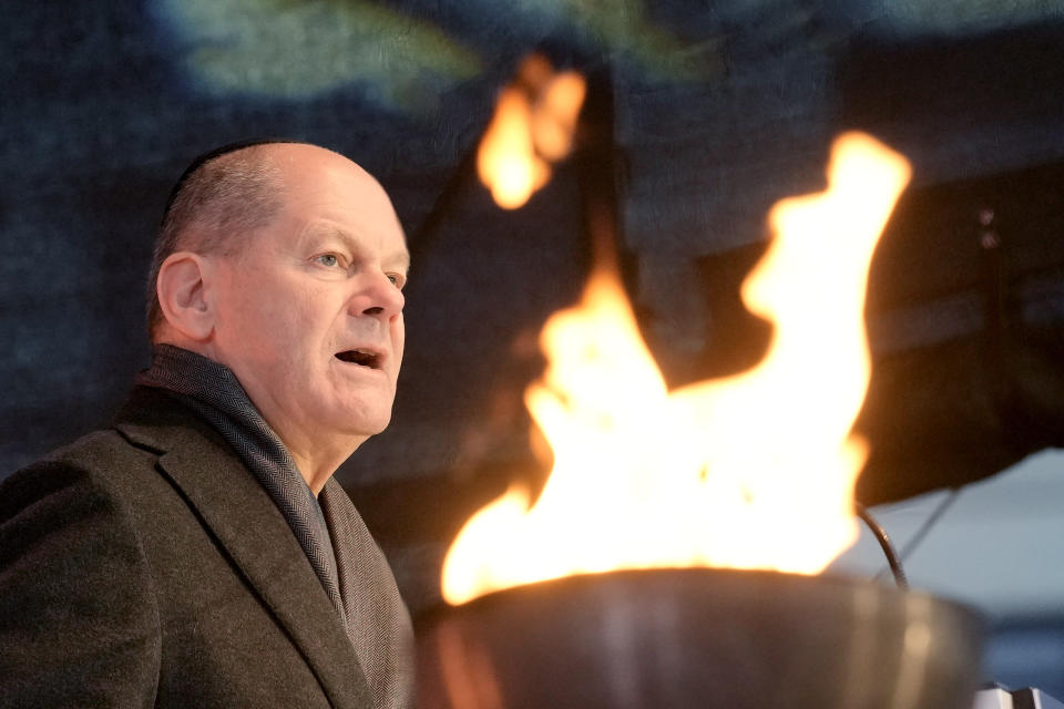 German Chancellor Olaf Scholz attends the ceremony to light the first candle of Hanukkah menorah at Brandenburg Gate in Berlin, Germany, Thursday, Dec. 7, 2023. (AP Photo/Markus Schreiber)
