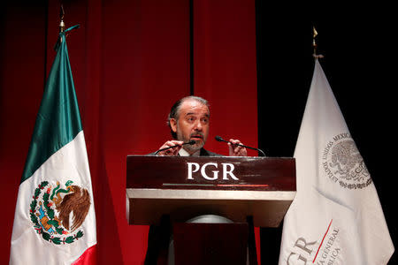 Attorney General Raul Cervantes speaks during a formal apology to three indigenous women who were wrongfully jailed for years, in Mexico City, Mexico February 21, 2017. REUTERS/Carlos Jasso