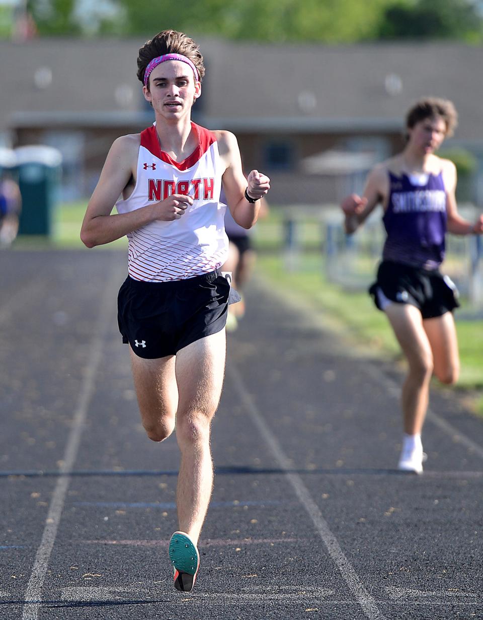 North Hagerstown's Alex Duncan wins the boys 1,600 during the Washington County Track & Field Championships at Boonsboro.