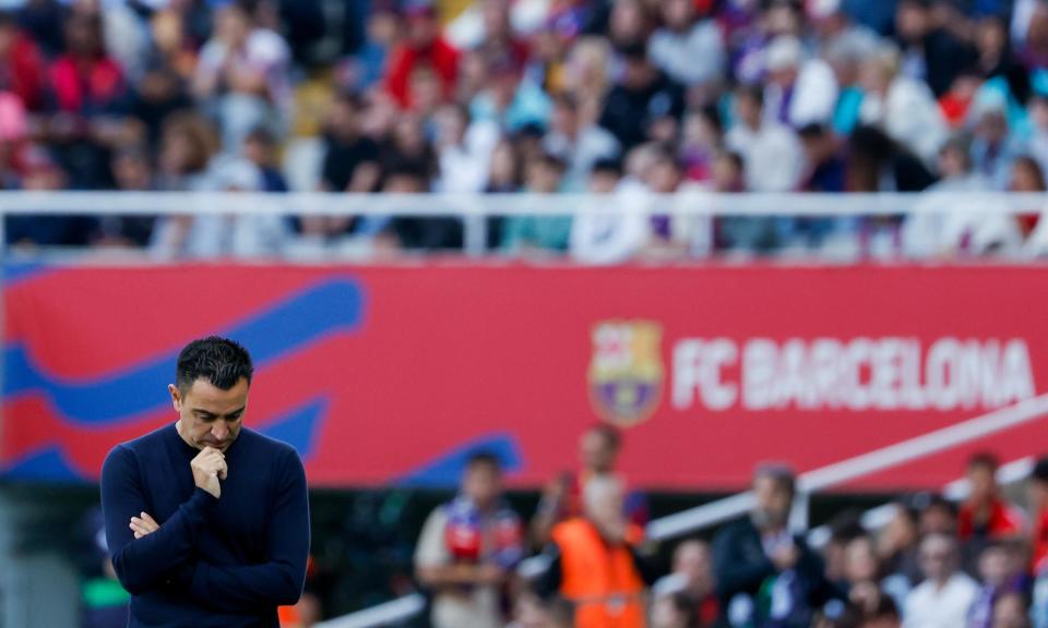 <span>Xavi lost in thought during <a class="link " href="https://sports.yahoo.com/soccer/teams/barcelona/" data-i13n="sec:content-canvas;subsec:anchor_text;elm:context_link" data-ylk="slk:Barcelona;sec:content-canvas;subsec:anchor_text;elm:context_link;itc:0">Barcelona</a>’s game against <a class="link " href="https://sports.yahoo.com/soccer/teams/vallecano/" data-i13n="sec:content-canvas;subsec:anchor_text;elm:context_link" data-ylk="slk:Rayo Vallecano;sec:content-canvas;subsec:anchor_text;elm:context_link;itc:0">Rayo Vallecano</a> last weekend.</span><span>Photograph: Joan Monfort/AP</span>