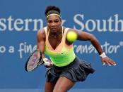 Aug 19, 2015; Cincinnati, OH, USA; Serena Williams (USA) charges the net to return a shot against Tsventana Pironkova (not pictured) on day five during the Western and Southern Open tennis tournament at Linder Family Tennis Center. Mandatory Credit: Aaron Doster-USA TODAY Sports