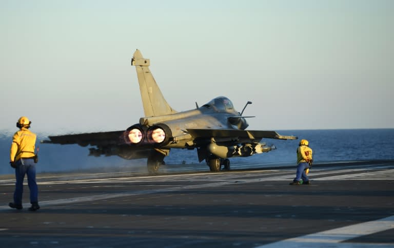 A French Rafale fighter jet is readied for take-off from the French aircraft carrier Charles de Gaulle in east Mediterranean sea on September 30, 2016 at the start of an operation against the Islamic State group