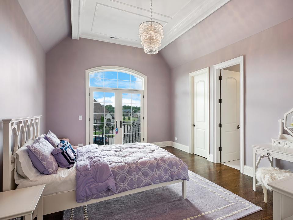 Bedroom with purple walls