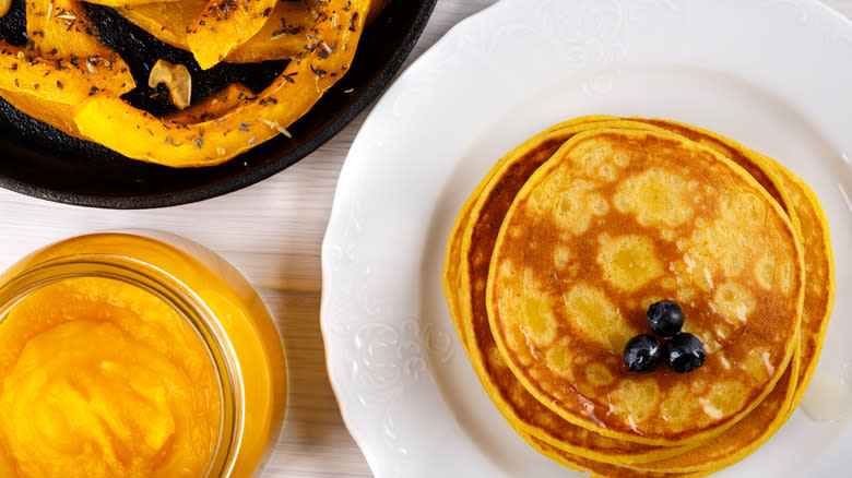 Pumpkin pancakes and whole pumpkins