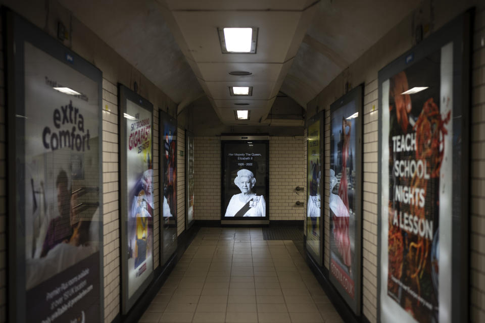 A photo of Queen Elizabeth II is seen at a subway station in London, Sept. 9, 2022. (AP Photo/Felipe Dana)