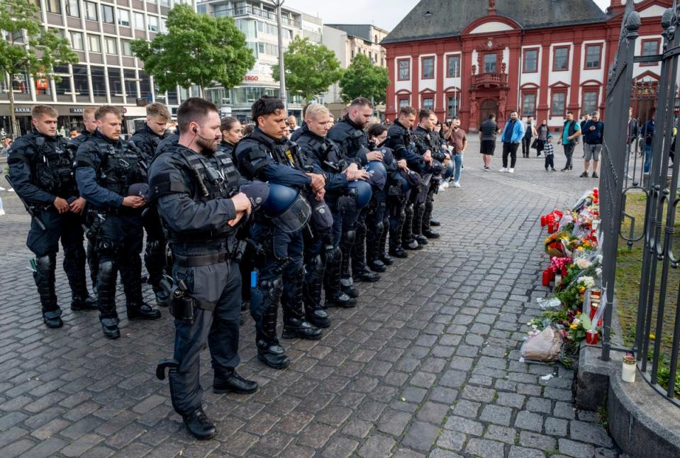 German police officers commemorate their colleague in Mannheim Germany (AP)