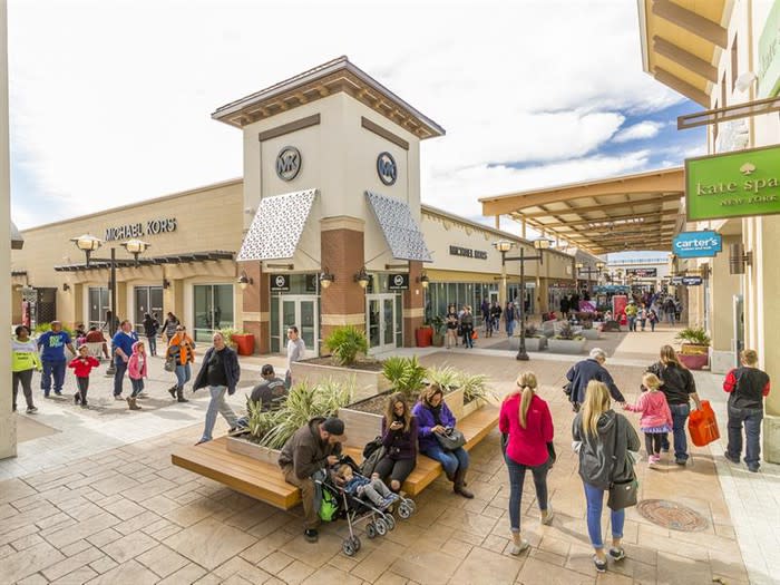 Exterior of a Tanger outlet center in Fort Worth.