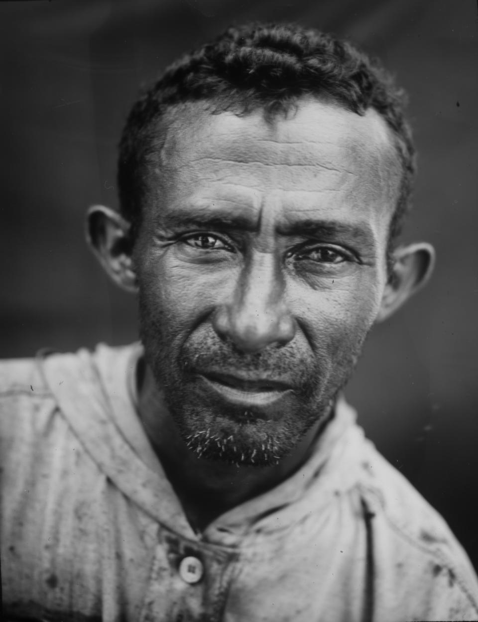 Fisherman Juzman Garcia poses for a portrait after his workday on oil-contaminated Lake Maracaibo in Cabimas, Venezuela. (Photo: Rodrigo Abd/AP)