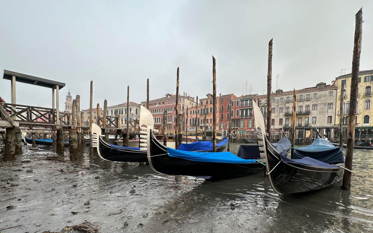Last week the city's picturesque canals were reduced to a muddy trickle - AP