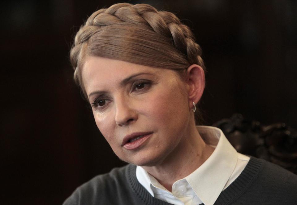 Former Ukrainian Prime Minister and candidate for the upcoming presidential elections Yulia Tymoshenko speaks during an interview with The Associated Press in Kiev, Ukraine, Saturday, April 26, 2014. Tymoshenko says Ukraine “must be a member of NATO” in order to protect itself from Russian aggression. While Tymoshenko has not previously backed NATO membership publicly, she and other Ukrainian politicians have ramped up the tough rhetoric as pro-Russia militias seized police stations and government buildings across eastern Ukraine. (AP Photo/Sergei Chuzavkov)