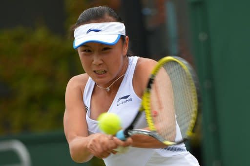 China's Peng Shuai plays a shot during her second round women's singles match against Japan's Ayumi Morita on day three of the 2012 Wimbledon Championships tennis tournament at the All England Tennis Club in Wimbledon, southwest London. Peng won the match