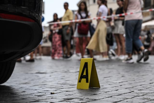 A gun casing is pictured on cobblestones after police shot in the tires of a car that failed to stop at a halt and broke through barriers on Via Paulo VI in Rome at the border of the Vatican on June 19. 