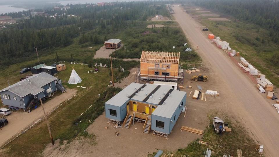 Housing units being built in an N.W.T. community, part of 100 being added to the public housing stock across the territory. (Submitted by Housing N.W.T. - image credit)