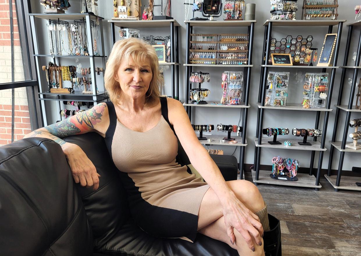 Michele Seib, owner of Shear Karma Hair Gallery, pictured at her salon on Wednesday, Feb. 21, 2024, is aiming to open her new retail clothing store, Divine Designs Downtown, on March 1.