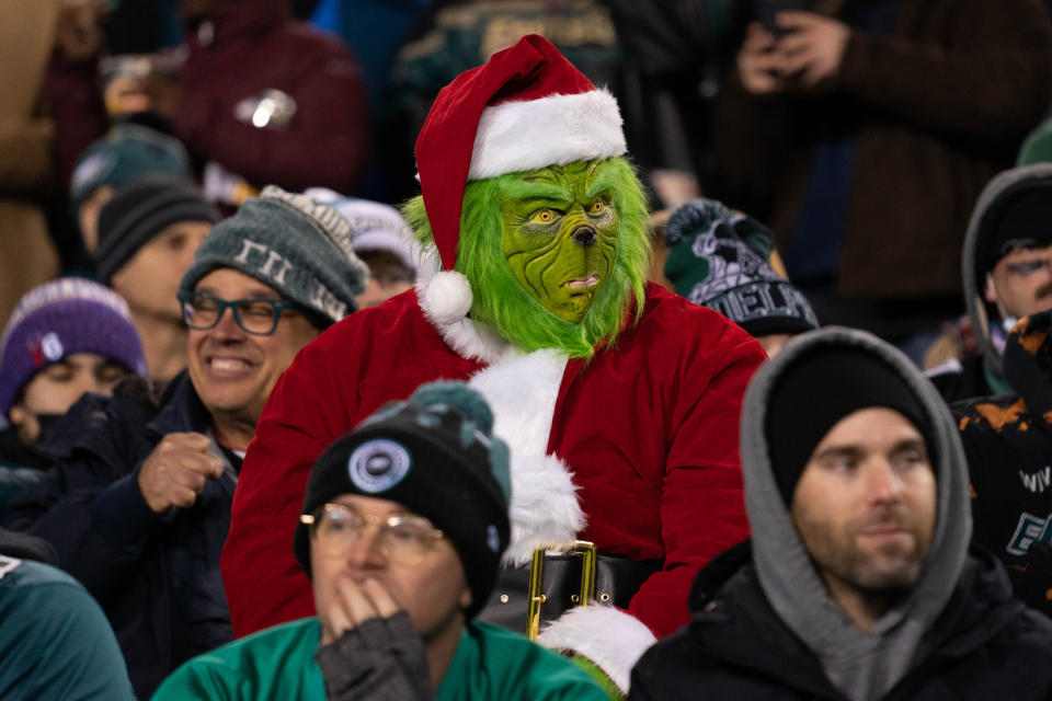 Dec 21, 2021; A fan dressed as the Grinch looks on during the second quarter of a game between the Philadelphia Eagles and the Washington Football Team Credit: Bill Streicher-USA TODAY Sports