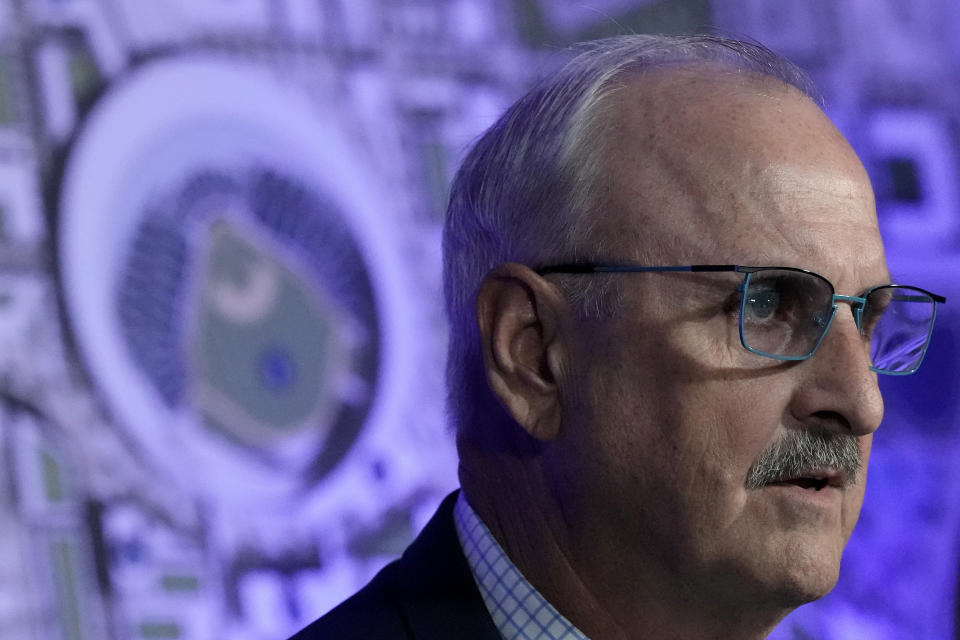 Earl Santee, Populous Senior Principal, Global Chair and Founder, talks about proposals to build a new stadium for the Kansas City Royals baseball team during a news conference Tuesday, Aug. 22, 2023, in Kansas City, Mo. (AP Photo/Charlie Riedel)