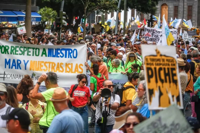 Thousands of people demonstrate to demand a tourism model respectful for  the islands environment and their residents, on the Canary Island of Tenerife, on April 20, 2024.