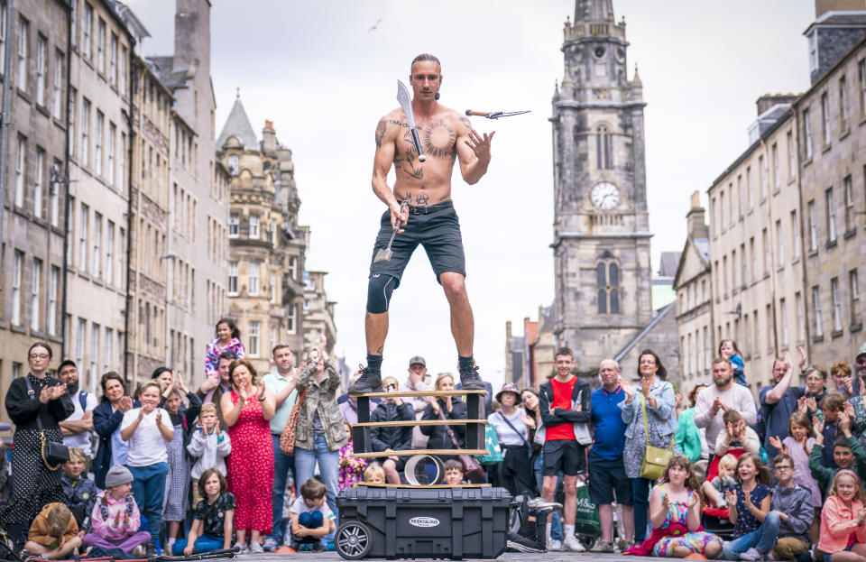 Edinburgh’s famous festival season attracts thousand of performers and tourists to the city in August (Jane Barlow/PA)
