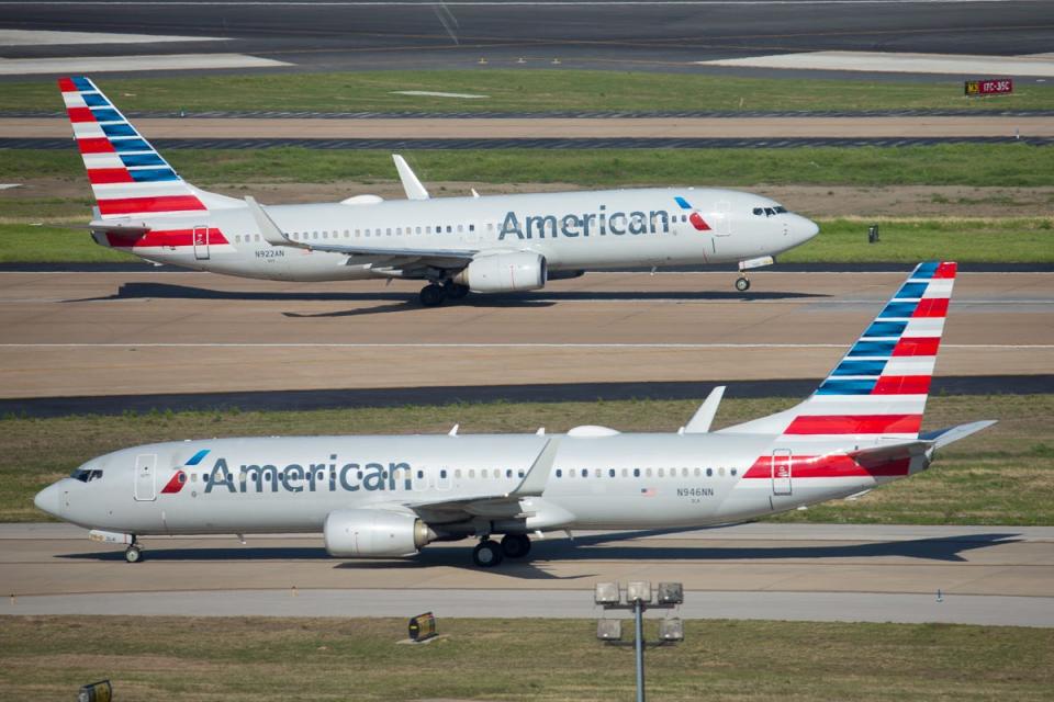 American Airlines Boeing 737-800 jets trade places at Dallas-Fort Worth International Airport in April 2019.