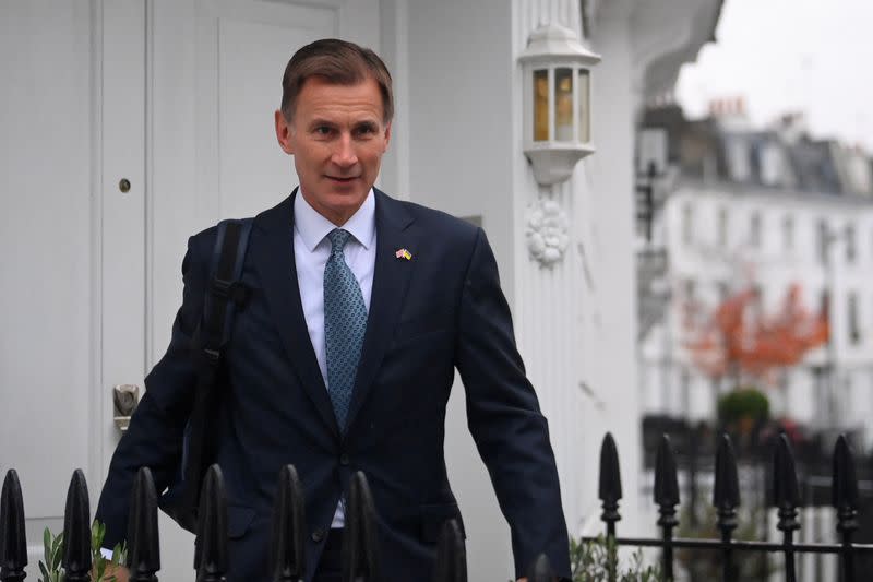 British Chancellor of the Exchequer Jeremy Hunt leaves his home, in London