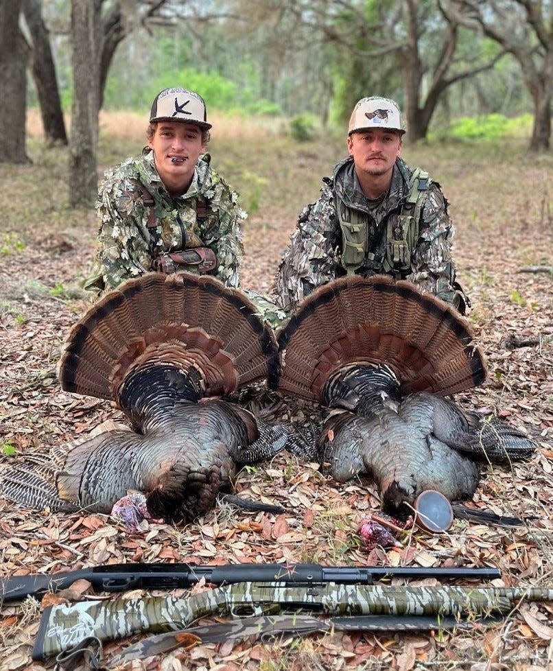 Thomas Delaney (left) and brother Cois put down the fishing poles and grabbed the hunting gear for the first day of turkey season.