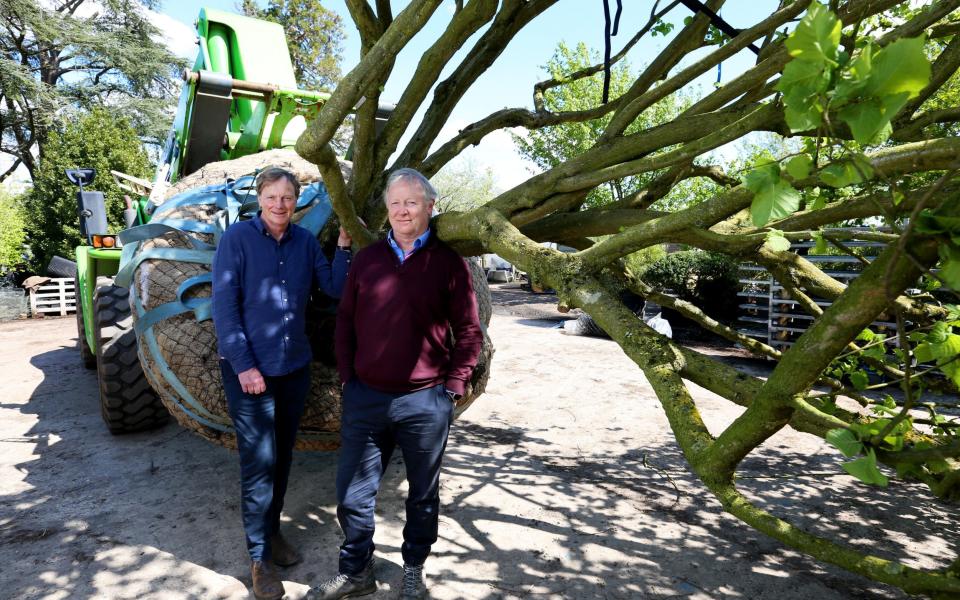 Mark Fane and Peter Clay with a tractor