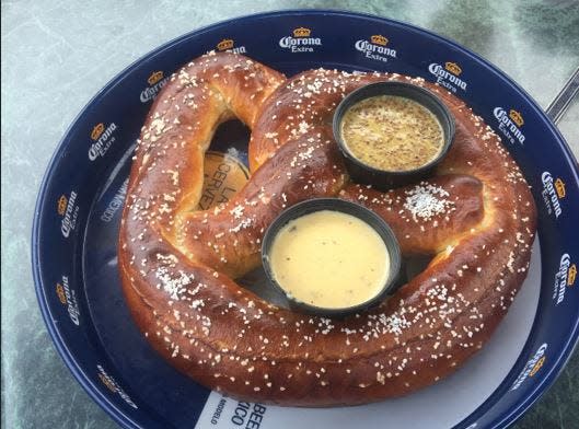 Though they should be eaten with a great beer at the ready, Schmidtke's pretzels are even better with his homemade mustard and cheese sauce.