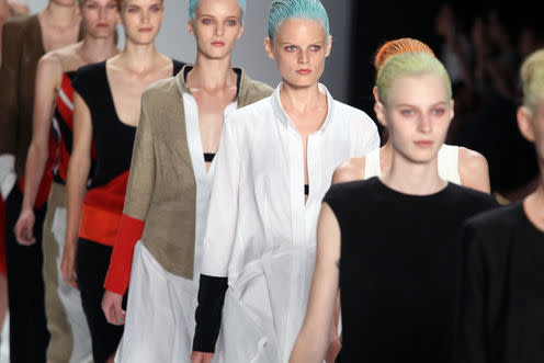 <span class="caption">Model Hanne Gaby Odiele (in white) has been outspoken about experiencing life as intersex.</span> <span class="attribution"><span class="source">Shutterstock</span></span>